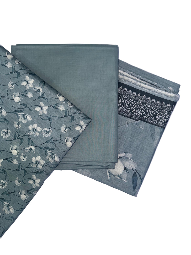 Collection of green fabric swatches with floral and abstract patterns on a white background